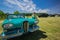 Gorgeous view of old vintage classic car with pretty smiled little girl standing beside