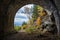 A gorgeous view from the tunnel of the Circum-Baikal Railway on a bright autumn landscape on the shore of Lake Baikal.