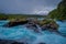 Gorgeous view of water passing through volcanic rock creating waterfalls, formed by an eruption of volcano Osorno in the