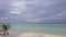 Gorgeous view white sand beach, turquoise water, blue sky and white clouds on Indian ocean background.