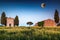 Gorgeous Vitaleta chapel at sunset with full moon, Tuscany, Italy