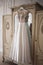 Gorgeous wedding dress on a vintage wardrobe