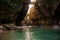 Gorgeous wide shallow mountain river among the rocks and plants