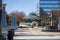 A gorgeous winter landscape at the Decatur Square with red and yellow autumn trees, lush green trees, a round blue pergola