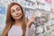 Gorgeous woman shopping at the drugstore