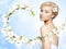 Gorgeous young blond woman with spring flower branch