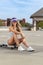 Gorgeous Young Coed Model Enjoying The Warm Weather With Her Skateboard