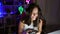 Gorgeous young hispanic woman streamer confidently owning the night