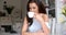 Gorgeous young woman sitting drinking coffee