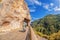 Gorges de la Nesque, road tunnel with scooter in Luberon national park, Provence, France