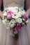 Gorgeuos wedding bouquet in pink and peach