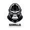 Gorilla head creative logo. Aggressive ape head concept one color flat style logo. White graphic drawing on a black background.