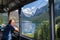 Gosaukammbahn cable car over Vorderer Gosausee lake under Donnerkogel Mountain, Austria