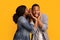 Gossips Concept. Black Woman Sharing Secret With Her Excited Boyfriend