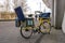 Gothenburg, Sweden - April 14, 2020: A yellow Swedish postal service delivery bike in Gothenburg city