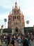 Gothic church with Palm trees native celebration  San Miguel de Allende Guanajuato Mexico Parroquia