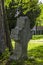 Gothic cross and tomb in cemetery at Saint-Hubert church, Aubel