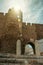 Gothic door called Sun Gateway on sunshine at Estremoz