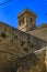 Gothic fortress walls surrounding Iglesia de Santa Maria church in Ujue, Spain
