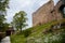 Gothic medieval castle Velhartice in sunny day, tower and stone arch bridge, fortress masonry wall, old stronghold, Velhartice,