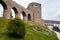 Gothic medieval castle Velhartice in sunny day, tower and stone arch bridge, fortress masonry wall, old stronghold, Velhartice,