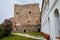 Gothic medieval castle Velhartice, sunny day, white mansion, facade with arches, masonry wall, old stronghold with tower,