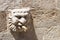 Gothic stone head of Fontain of the Church in Solsona, Lleida,Catalonia, Spain