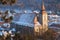 Gothic-style Black Church of Brasov city, Romania, as seen from a high vantage point, at sunset, on a Winter day