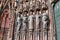 Gothic style figures on main portal of west facade of famous Strasbourg Cathedral in France