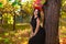 Gothic woman at the colorfull nature background