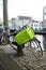 Gouda  South Holland The Netherlands - January 21 2021: Dutch old bike with bright green crate parked next to the canal in Gouda