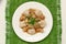 Goulash with oyster mushroom and buckwheat dumplings on the green gunny cloth