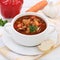 Goulash soup with meat, baguette and paprika healthy eating