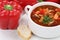 Goulash soup with meat and paprika in cup closeup