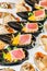 Gourmet appetizers: caviar, venison, tuna and salmon