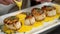 Gourmet chef cooking grilled scallops in creamy lemon butter or cajun sauce with herbs