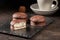 Gourmet chocolate marshmallow on dark background, artistic low key image