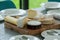 Gourmet Delights: An Assortment of Fine Cheeses on a Wooden Board