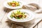 Gourmet fish salad. Pangasius dori fillet, vegetables, avocado pate, mozzarella and fresh herbs. Restaurant serving. Chef`s dish
