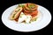 Gourmet, goat cheese salad with tomato, roasted zucchini, baguette and basil sauce on a white round plate,