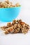 Gourmet granola in blue bowl vertical