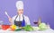 Gourmet main dish recipes. Cooking is her hobby. Cooking healthy food. Girl in hat and apron. Woman chef cooking healthy