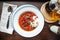 Gourmet mediterranean tomato soup with sour cream