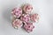 Gourmet pink decorated cupcakes on table