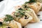 Gourmet pita rolls with salmon, black caviar and dill