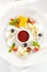 Gourmet, restaurant, delicious dinner food - close up of cheese plate with honey dip and fresh berries.