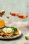 Gourmet Roasted Peaches with Burrata soft cheese, basil and drizzled with honey, with rose wine. Antipasto Dinner or aperitivo