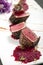 Gourmet seared tuna in black pepper crust with beetroot coulis