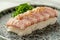 Gourmet Seared Tuna Sushi on Elegant Plate with Sesame Seeds and Green Seaweed Garnish, Traditional Japanese Cuisine for Fine