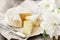 Gourmet spicy Camembert cheese, brie on white paper background with cheese knife. Spicy appetizer for gourmets. Selective focus